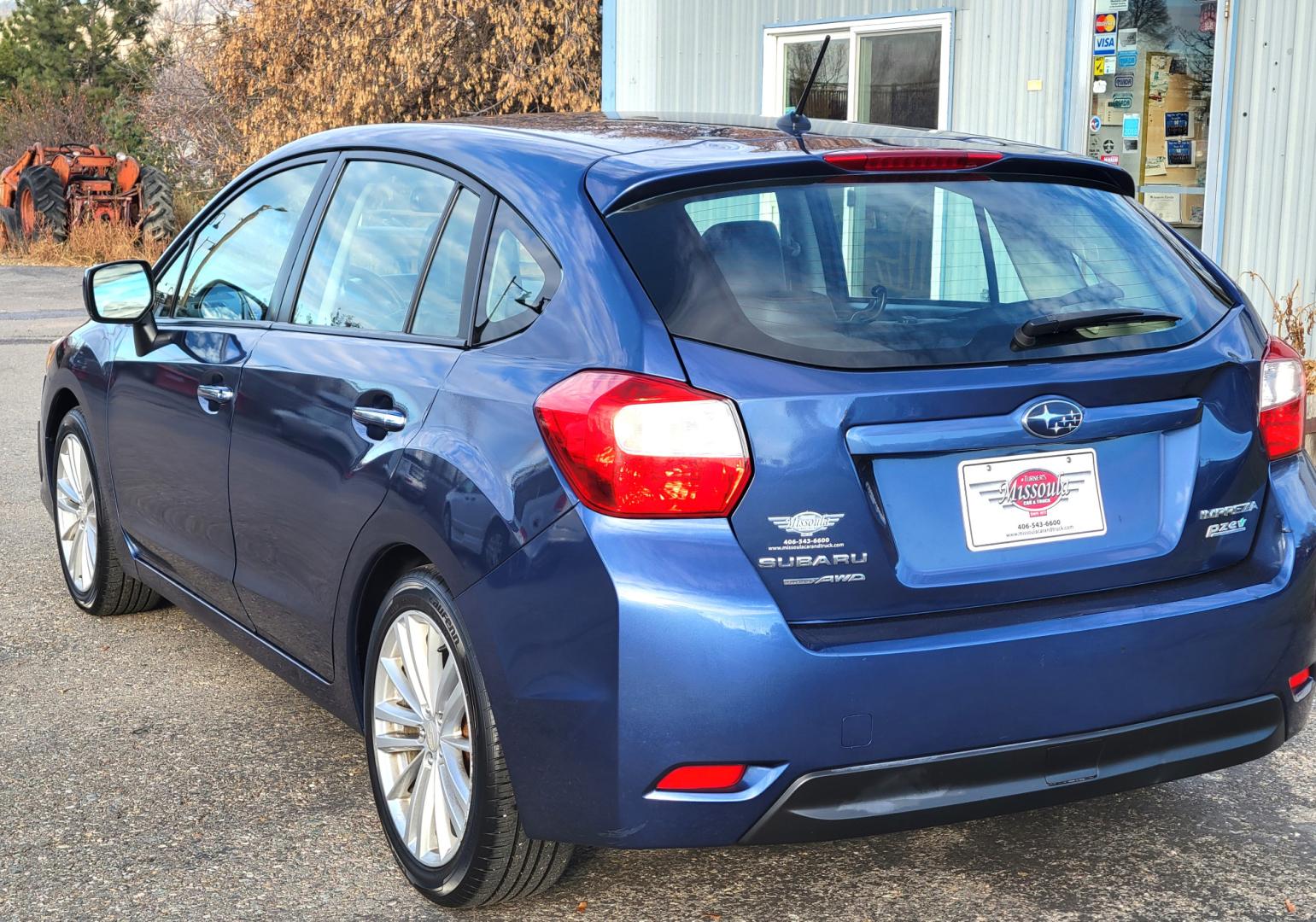 2012 Blue /Black Subaru Impreza Limited 5-Door (JF1GPAG65CH) with an 2.0L H4 DOHC 16V engine, Continuously Variable Transmission transmission, located at 450 N Russell, Missoula, MT, 59801, (406) 543-6600, 46.874496, -114.017433 - Good Runner. Excellent MPG. Automatic Transmission. Heated Seats. Air. Cruise. Tilt. Bluetooth. has Timing Chain. Not a Timing Belt. - Photo#5